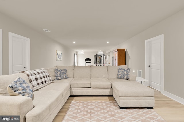 15613 Althea Ln, Gainesville, VA 20155 - living room featuring light wood finished floors, recessed lighting, and baseboards