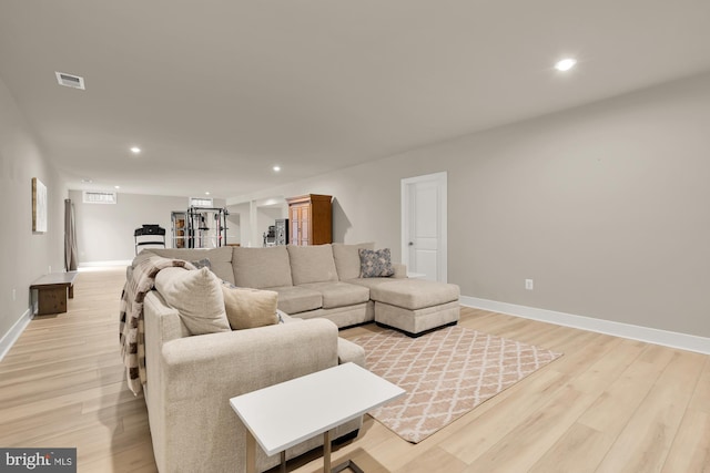 15613 Althea Ln, Gainesville, VA 20155 - living area featuring light wood finished floors, recessed lighting, and baseboards