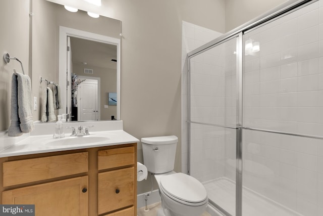 15613 Althea Ln, Gainesville, VA 20155 - bathroom with toilet, vanity, and tiled shower