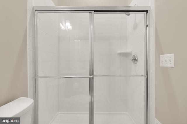 15613 Althea Ln, Gainesville, VA 20155 - bathroom featuring a stall shower and toilet