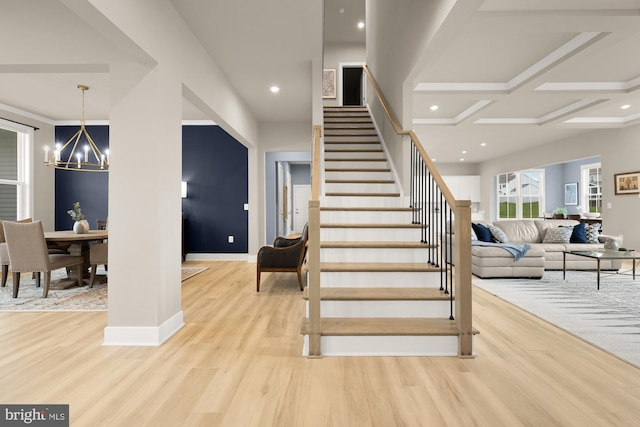 15613 Althea Ln, Gainesville, VA 20155 - stairs featuring a chandelier, wood finished floors, baseboards, and recessed lighting
