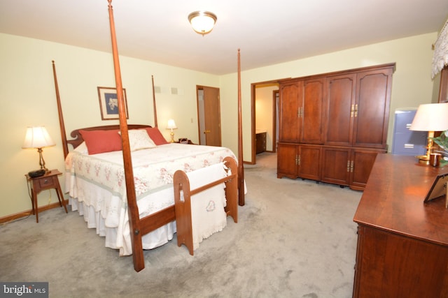 bedroom with light colored carpet