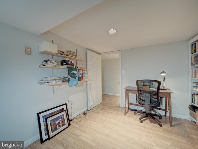 office featuring recessed lighting, baseboards, and light wood-style flooring