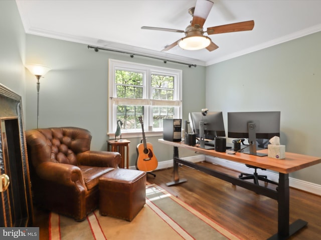 office with ceiling fan, crown molding, and wood finished floors