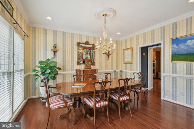 dining room featuring wallpapered walls and a wealth of natural light