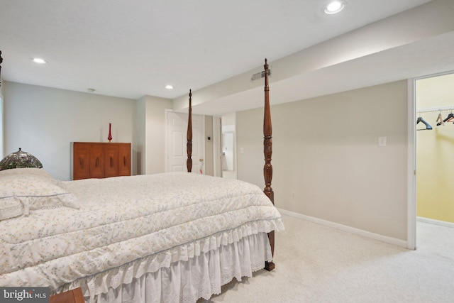 bedroom featuring carpet flooring, baseboards, and recessed lighting