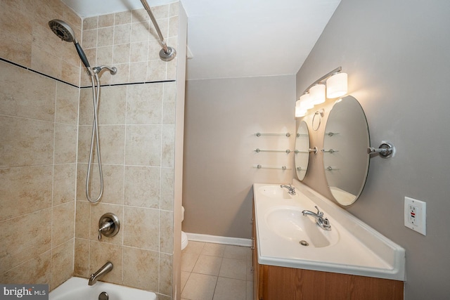 full bath featuring vanity, tile patterned flooring, baseboards, and  shower combination
