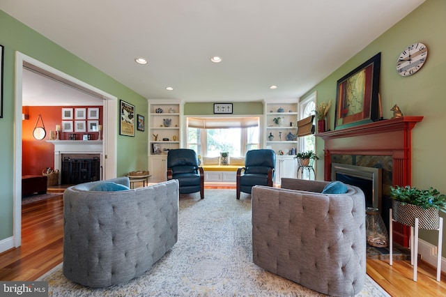 7228 Devereux Ct, Alexandria, VA 22315 - living room featuring a premium fireplace, recessed lighting, and wood finished floors