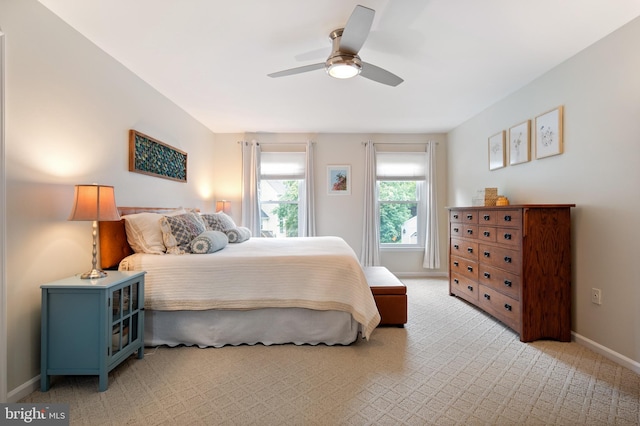 7228 Devereux Ct, Alexandria, VA 22315 - bedroom with baseboards, light colored carpet, and a ceiling fan