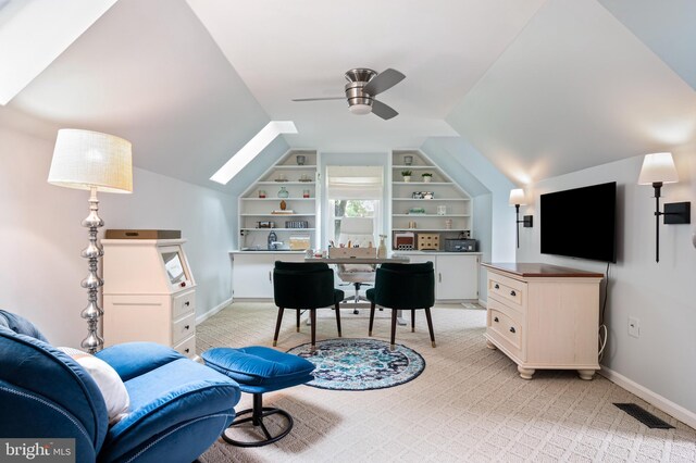 7228 Devereux Ct, Alexandria, VA 22315 - home office with light colored carpet, built in shelves, a ceiling fan, vaulted ceiling, and baseboards