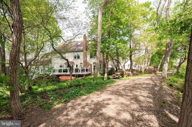 7228 Devereux Ct, Alexandria, VA 22315 - back of house featuring a chimney and a wooden deck