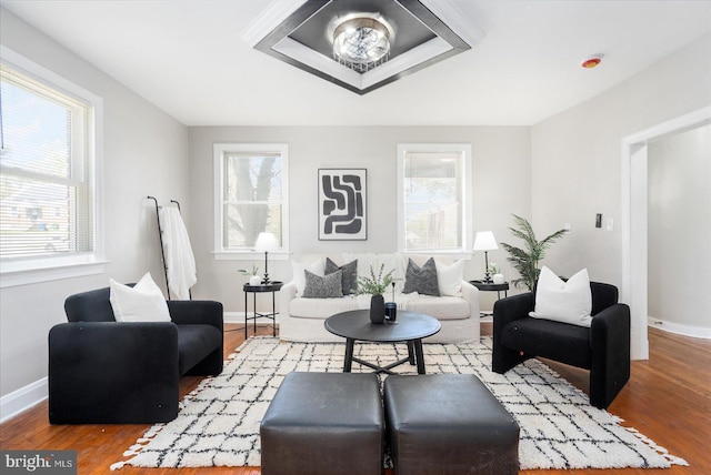 6217 Burgess Ave, Baltimore, MD 21214 - living area with baseboards and wood finished floors