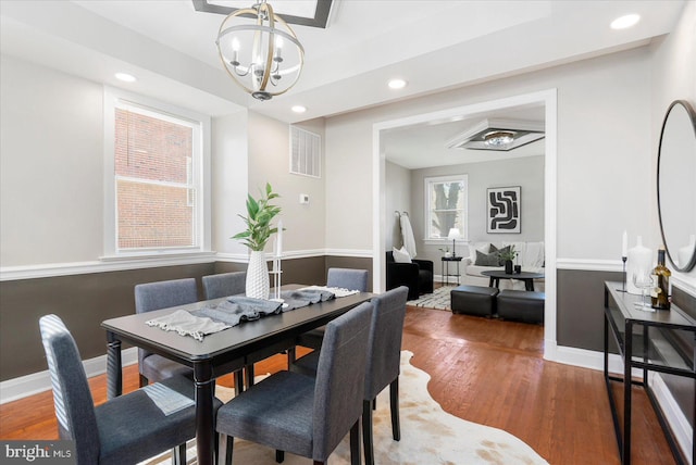 6217 Burgess Ave, Baltimore, MD 21214 - dining space featuring baseboards, an inviting chandelier, wood finished floors, and recessed lighting