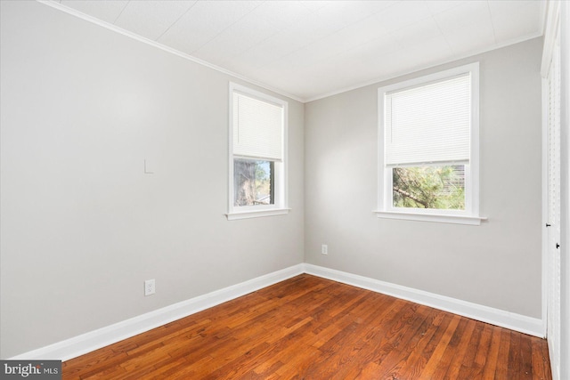 6217 Burgess Ave, Baltimore, MD 21214 - unfurnished room featuring crown molding, wood finished floors, and a healthy amount of sunlight