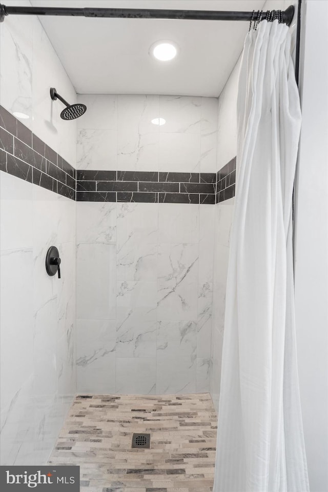 6217 Burgess Ave, Baltimore, MD 21214 - bathroom with a tile shower and recessed lighting