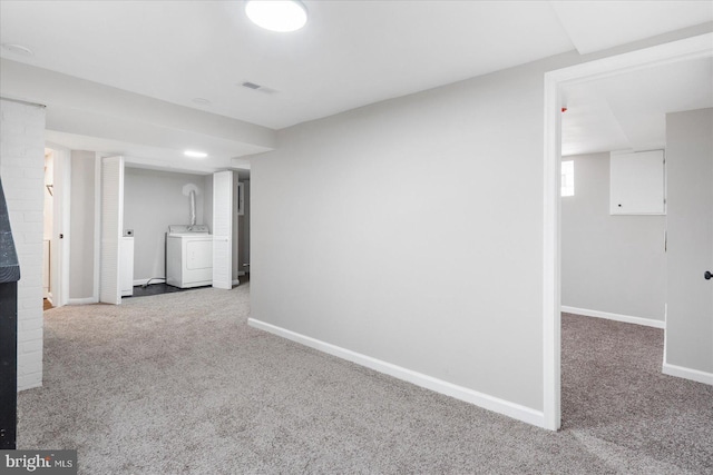 6217 Burgess Ave, Baltimore, MD 21214 - finished below grade area featuring visible vents, baseboards, carpet flooring, and washer / dryer