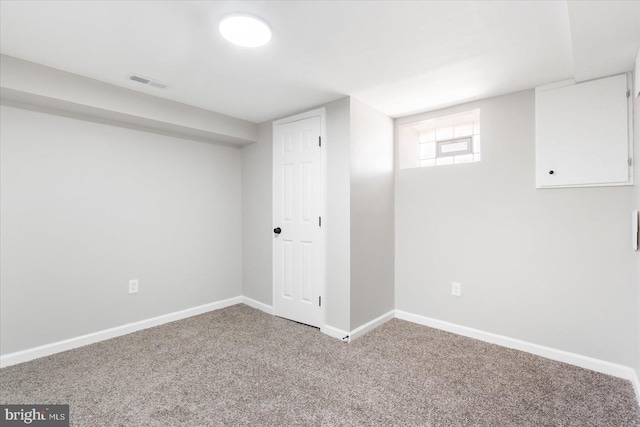 6217 Burgess Ave, Baltimore, MD 21214 - basement featuring baseboards, visible vents, and carpet