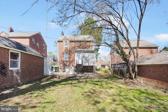 6217 Burgess Ave, Baltimore, MD 21214 - view of yard with fence, a residential view, and entry steps