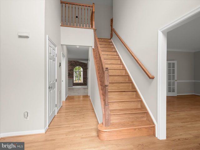 13148 Isle Of Mann Way, Highland, MD 20777 - stairway with wood finished floors, baseboards, and ornamental molding