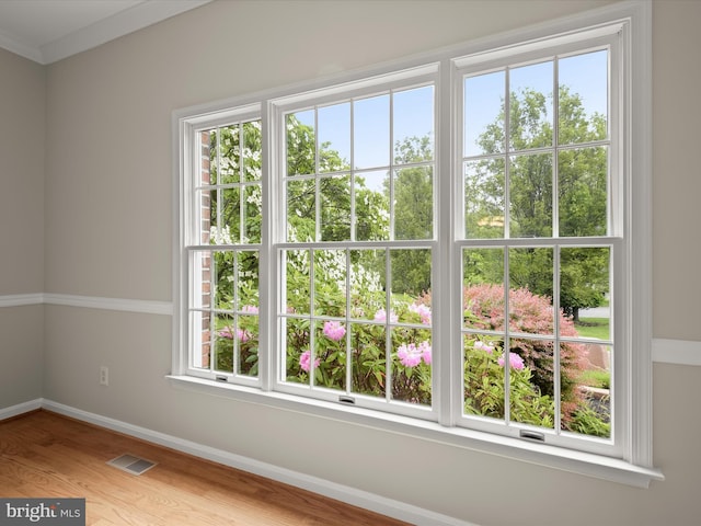 13148 Isle Of Mann Way, Highland, MD 20777 - unfurnished room with baseboards, wood finished floors, and plenty of natural light