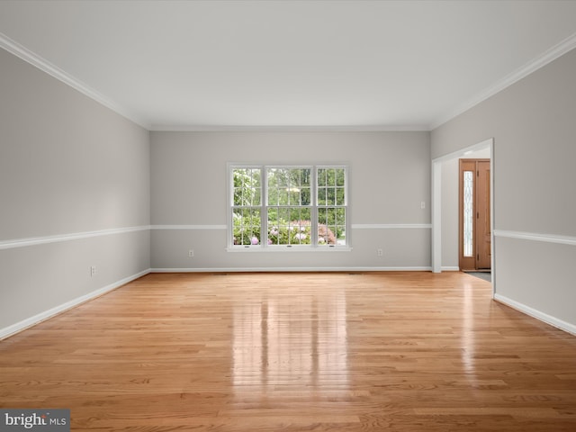 13148 Isle Of Mann Way, Highland, MD 20777 - spare room with light wood-style flooring, baseboards, and crown molding