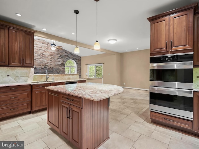 13148 Isle Of Mann Way, Highland, MD 20777 - kitchen with a sink, double oven, decorative backsplash, vaulted ceiling, and a kitchen island