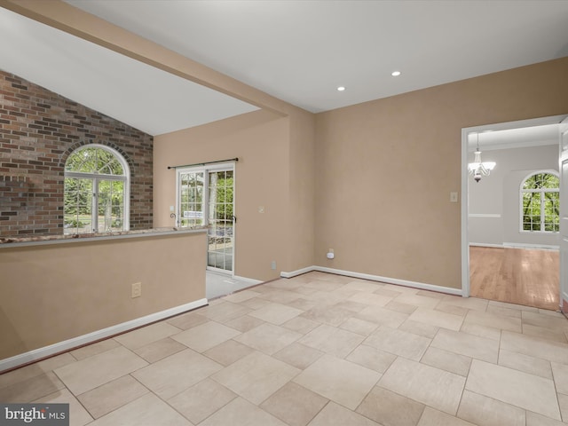 13148 Isle Of Mann Way, Highland, MD 20777 - empty room featuring a chandelier, baseboards, vaulted ceiling, and recessed lighting