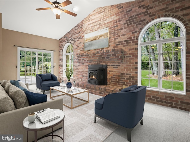13148 Isle Of Mann Way, Highland, MD 20777 - carpeted living area with a ceiling fan, plenty of natural light, a wood stove, brick wall, and high vaulted ceiling