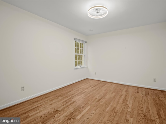 13148 Isle Of Mann Way, Highland, MD 20777 - unfurnished room featuring wood finished floors and baseboards