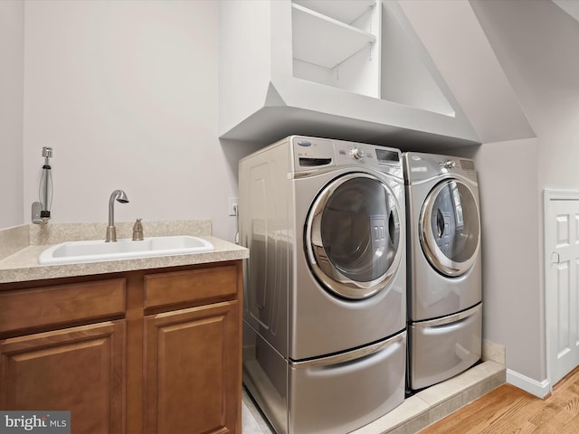 13148 Isle Of Mann Way, Highland, MD 20777 - washroom featuring independent washer and dryer and light wood finished floors