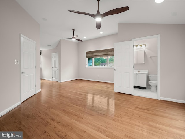 13148 Isle Of Mann Way, Highland, MD 20777 - unfurnished living room with ceiling fan, light wood-style floors, baseboards, recessed lighting, and lofted ceiling