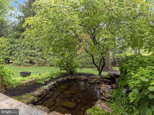 13148 Isle Of Mann Way, Highland, MD 20777 - view of grassy yard featuring a small pond