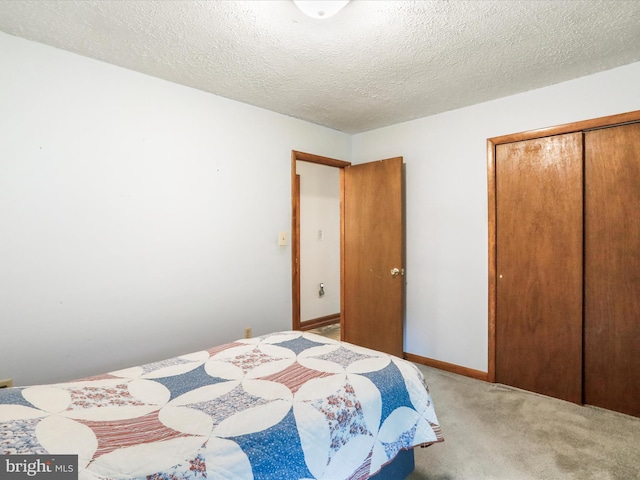 427 Oak Dale Ct, Capon Bridge, WV 26711 - carpeted bedroom with a closet and a textured ceiling