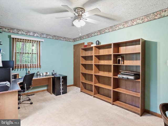 427 Oak Dale Ct, Capon Bridge, WV 26711 - carpeted office space featuring a textured ceiling, ceiling fan, and baseboards