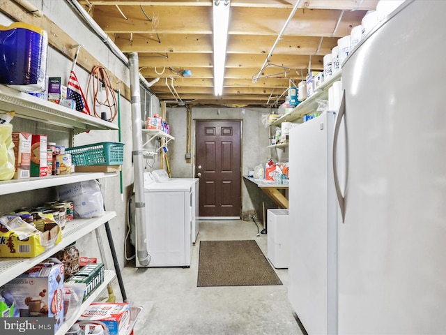 427 Oak Dale Ct, Capon Bridge, WV 26711 - unfinished below grade area featuring freestanding refrigerator and separate washer and dryer
