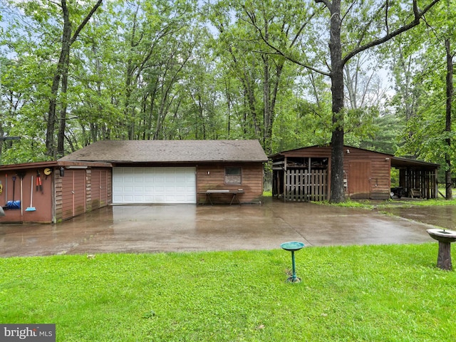 427 Oak Dale Ct, Capon Bridge, WV 26711 - view of front of property with an outdoor structure, a front yard, and driveway