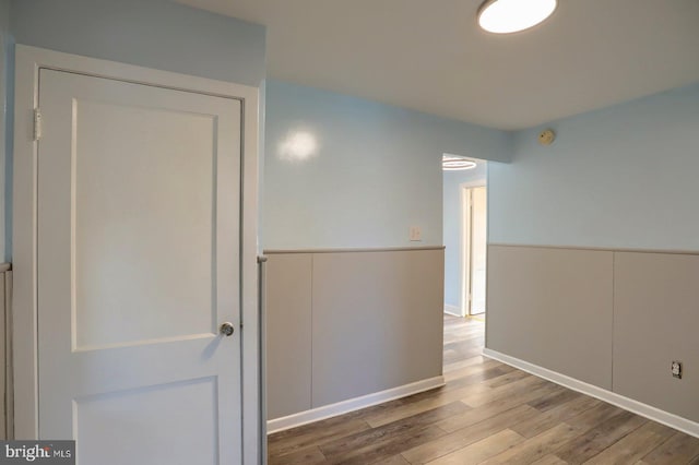 empty room featuring wood finished floors