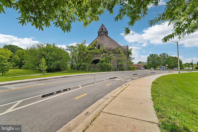 1714 Abbotston St, Baltimore, MD 21218 - view of asphalt road with sidewalks, curbs, and street lights