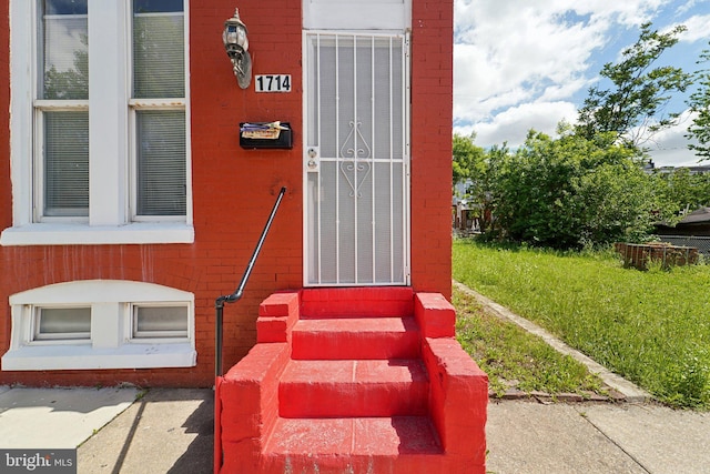 1714 Abbotston St, Baltimore, MD 21218 - doorway to property featuring brick siding