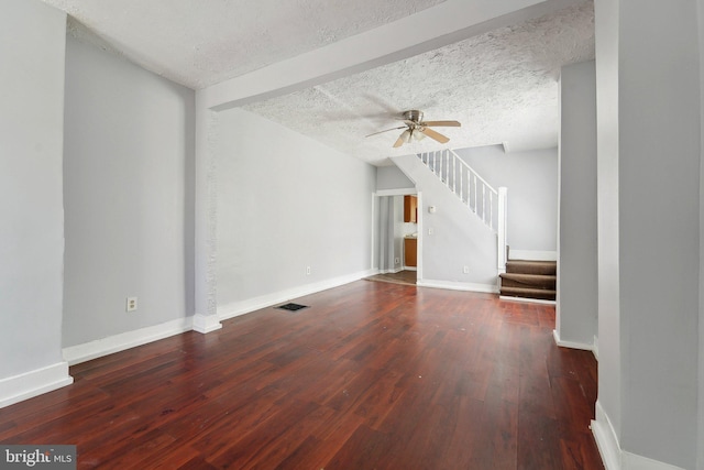 1714 Abbotston St, Baltimore, MD 21218 - unfurnished living room with stairway, a ceiling fan, wood finished floors, a textured ceiling, and baseboards