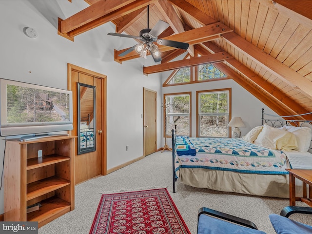 carpeted bedroom featuring vaulted ceiling with beams, baseboards, and wooden ceiling