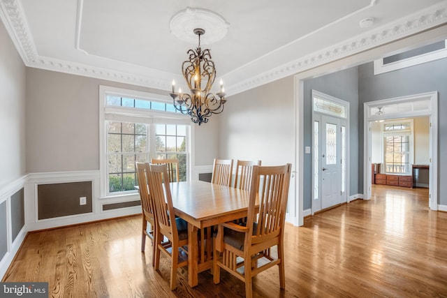 6041 Clairemont Dr, Owings, MD 20736 - dining room with an inviting chandelier and light wood-style flooring