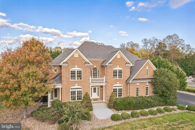 6041 Clairemont Dr, Owings, MD 20736 - view of front of property featuring brick siding and a balcony