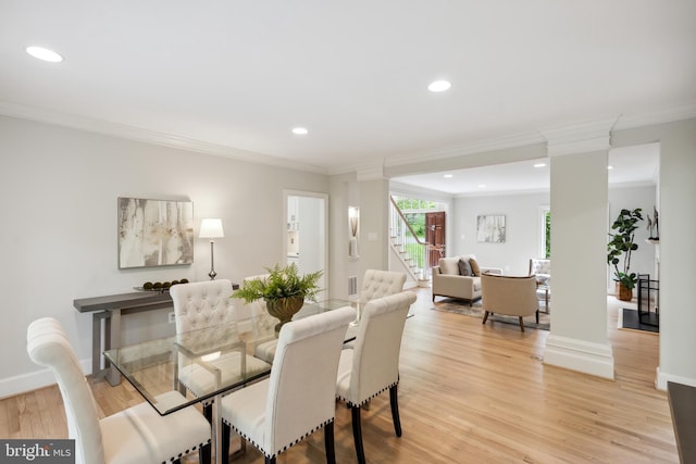 6530 Heather Brook Ct, Mclean, VA 22101 - dining room with stairs, recessed lighting, decorative columns, light wood-type flooring, and ornamental molding