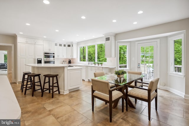 6530 Heather Brook Ct, Mclean, VA 22101 - dining room featuring a healthy amount of sunlight, baseboards, and recessed lighting