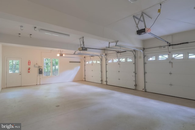 6530 Heather Brook Ct, Mclean, VA 22101 - garage featuring a garage door opener