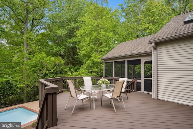 6530 Heather Brook Ct, Mclean, VA 22101 - wooden terrace featuring a sunroom, a fenced in pool, and outdoor dining space