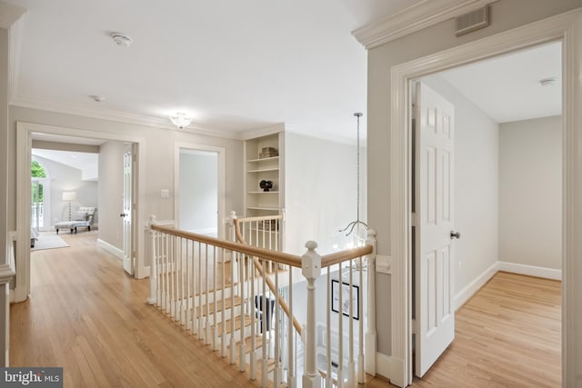 6530 Heather Brook Ct, Mclean, VA 22101 - corridor with baseboards, an upstairs landing, light wood-style flooring, and visible vents