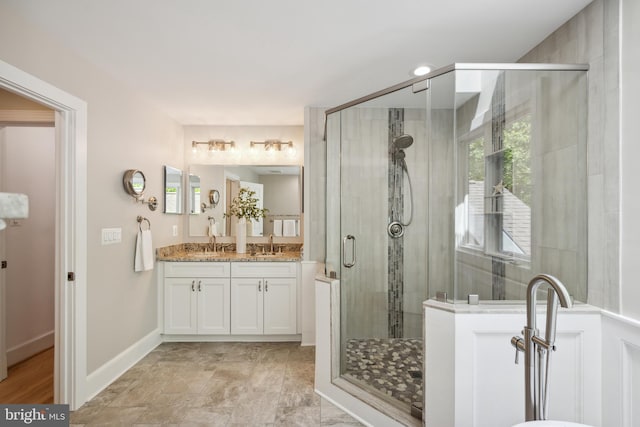6530 Heather Brook Ct, Mclean, VA 22101 - bathroom featuring baseboards, a shower stall, and vanity