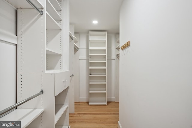 6530 Heather Brook Ct, Mclean, VA 22101 - walk in closet featuring light wood-style floors